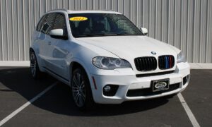 Why is it wise to buy a used car?